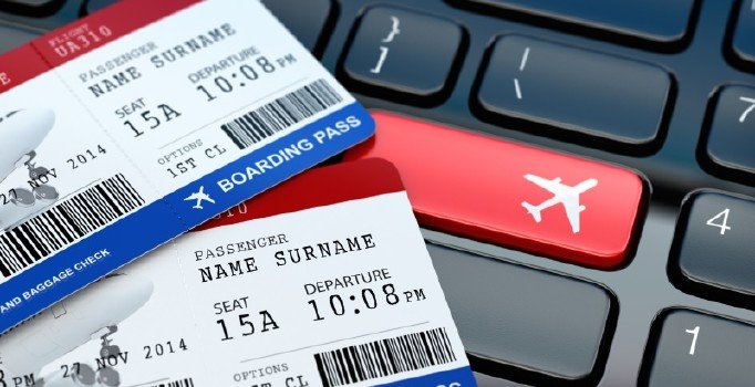online-ticket-booking-boarding-pass-on-laptop-keyboard
