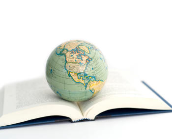 world globe on a open book
