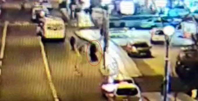 Çarşaflı ve silahlı soyguncuyu taksicinin dikkati yakalattı