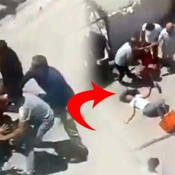 Yumrukla devirdiği kadını saçından sürükledi